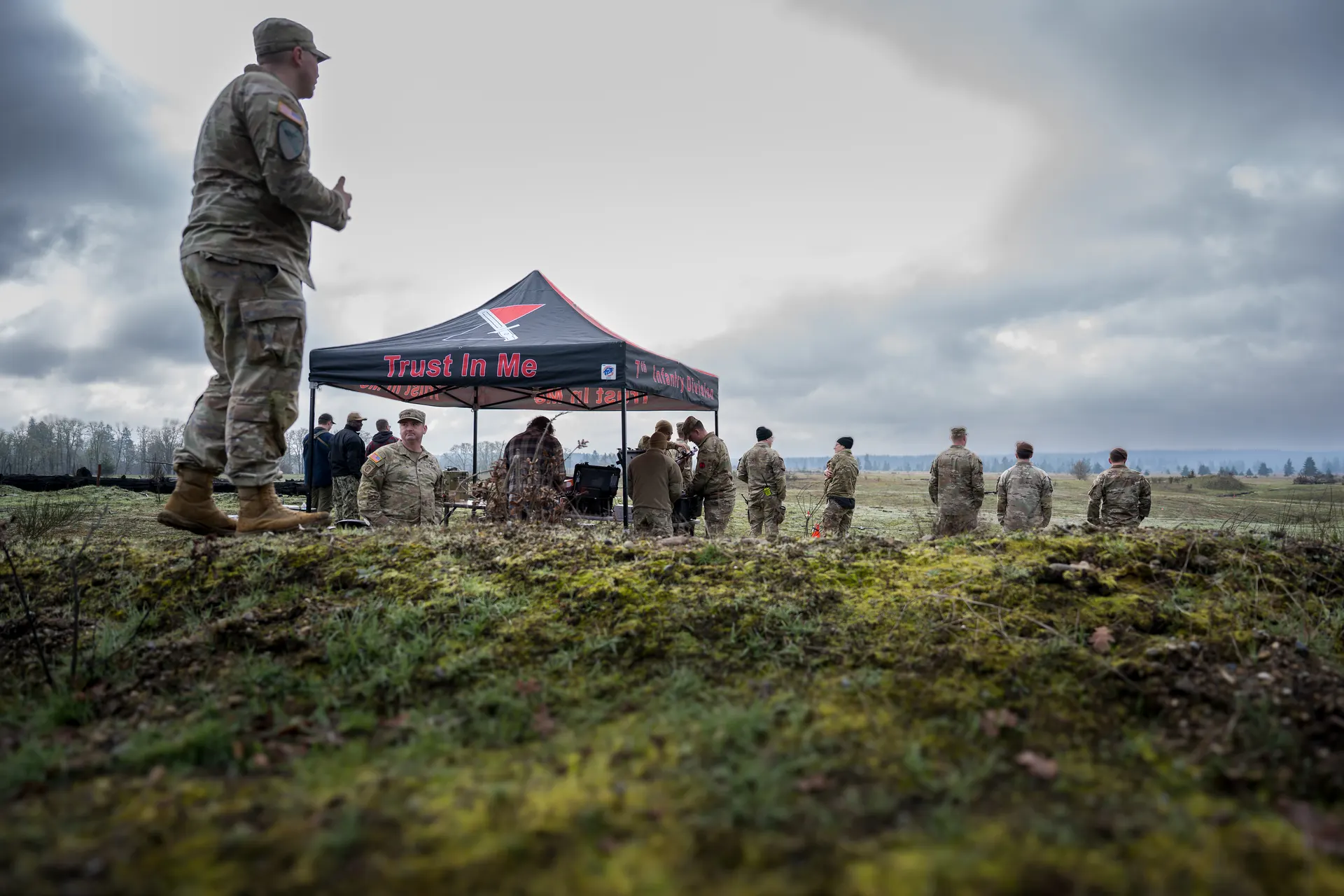 Soldiers gathered at vendor tent during Warfighter Ready field event